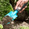 Hand-Trowel-Digging-Dirt-2.jpg