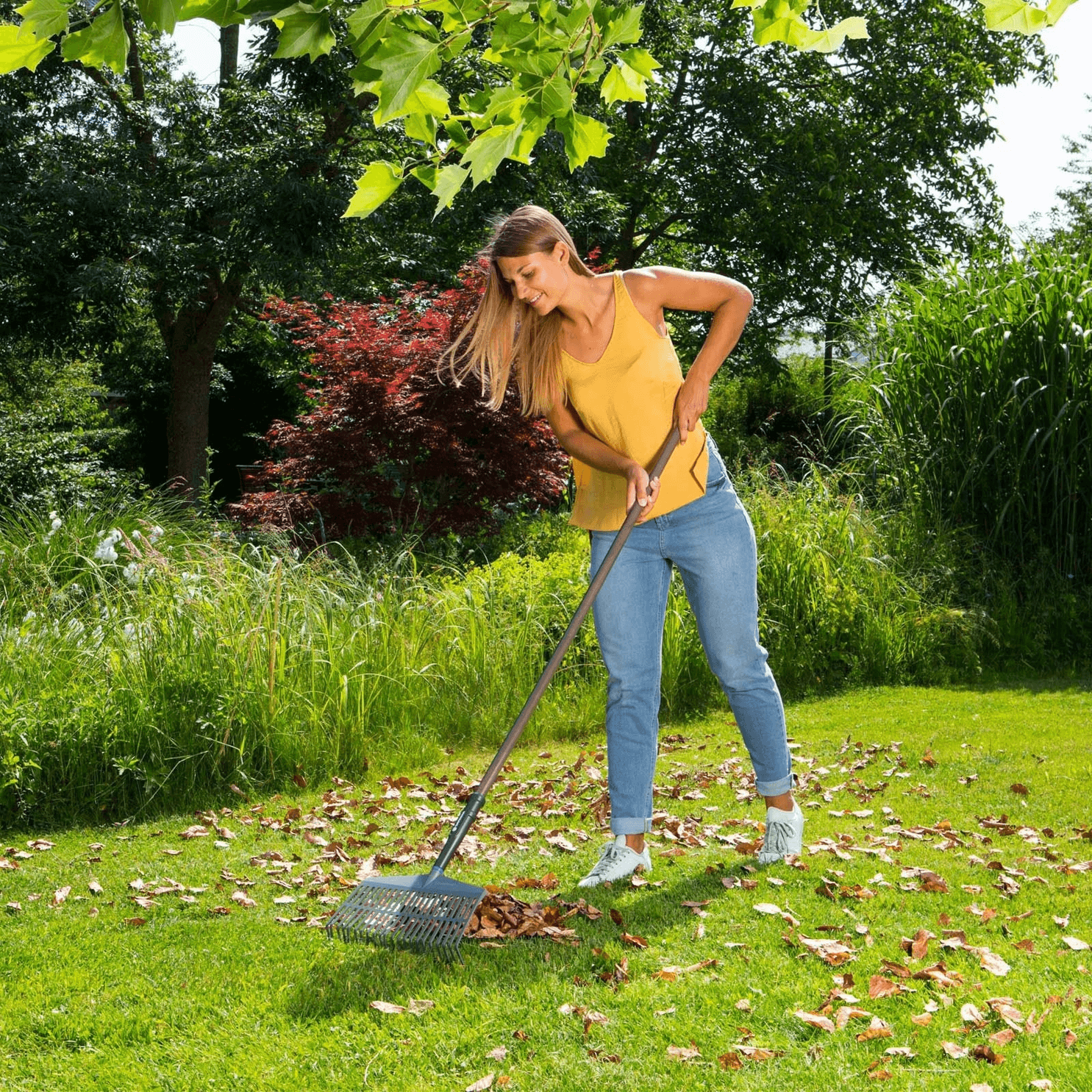 NatureLine-Lawn-Rake-woman-raking-leaves.png